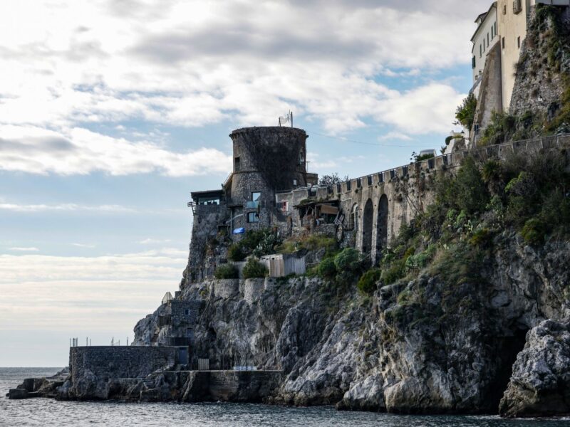 Charming view of historic architecture on the cliffside of Italy's Amalfi Coast.