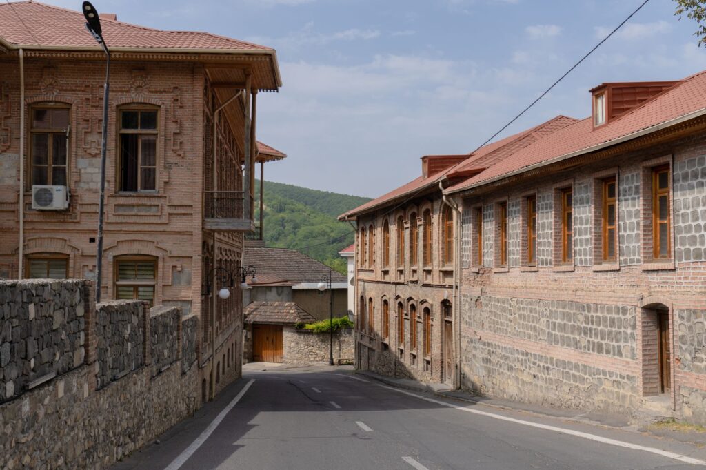 Charming view of traditional architecture on a sunny day in Sheki, Azerbaijan.