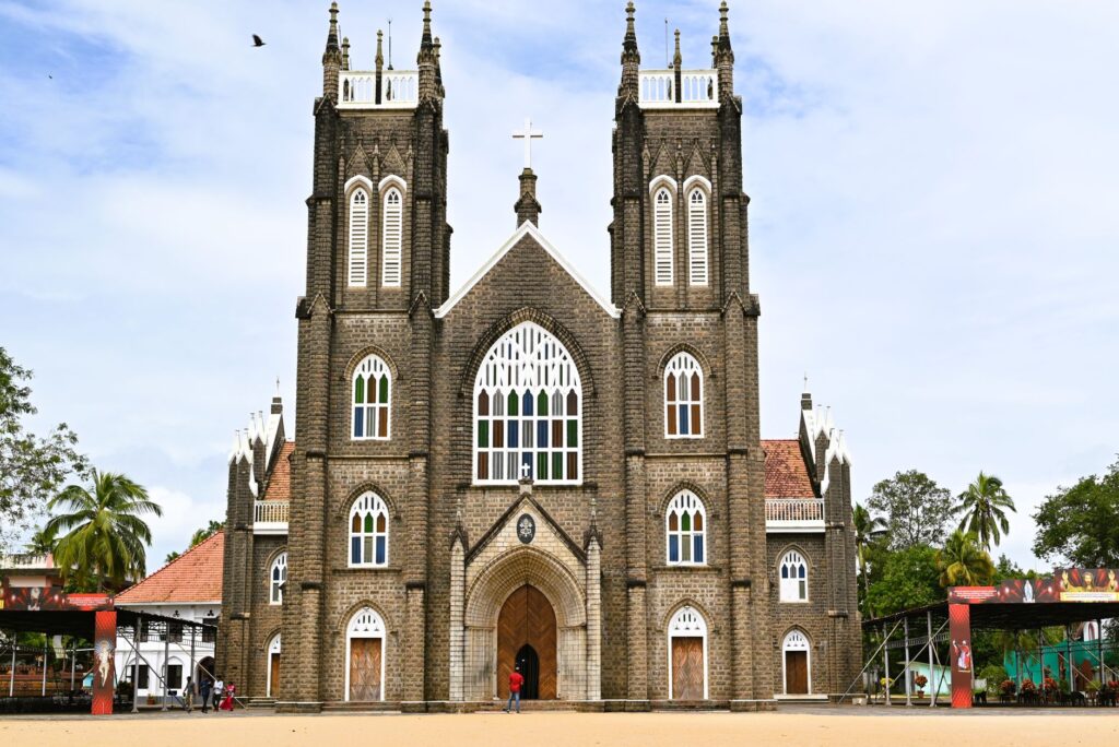 Gothic revival architecture of a cathedral in Kochi, Kerala during daytime.