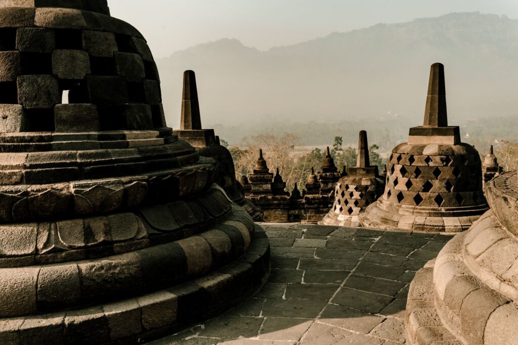 Stunning view of the ancient Borobudur Temple at sunrise in Central Java, Indonesia.