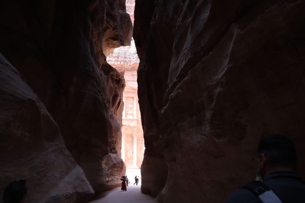 The Treasury at Petra viewed through the narrow Al Siq, in Wadi Musa, Jordan.