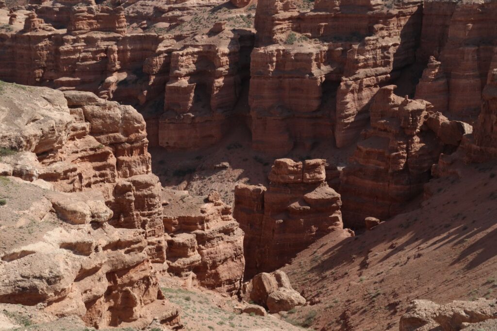 Explore the stunning red rock formations of Charyn Canyon in Kazakhstan's Almaty region.