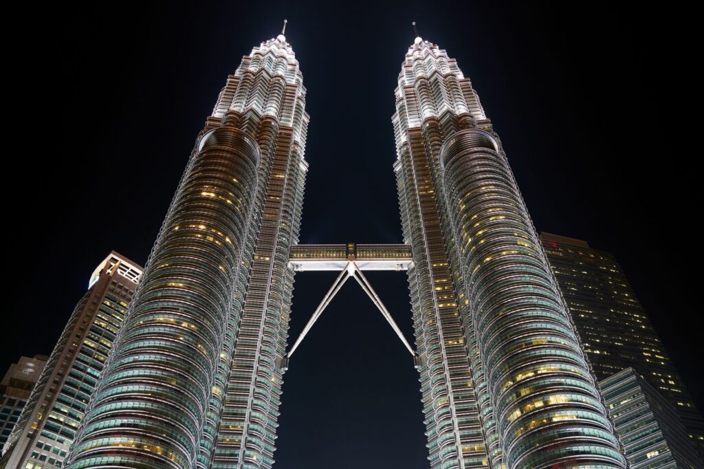 Magnificent view of Petronas Twin Towers in Kuala Lumpur, Malaysia at night.