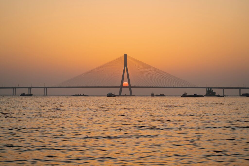 Captivating sunset view over the Bandra-Worli Sea Link bridge in Mumbai, India.