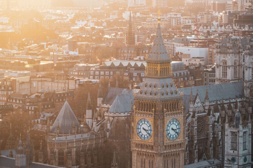 A beautiful view of Big Ben at sunset, showcasing the iconic London cityscape in warm tones.