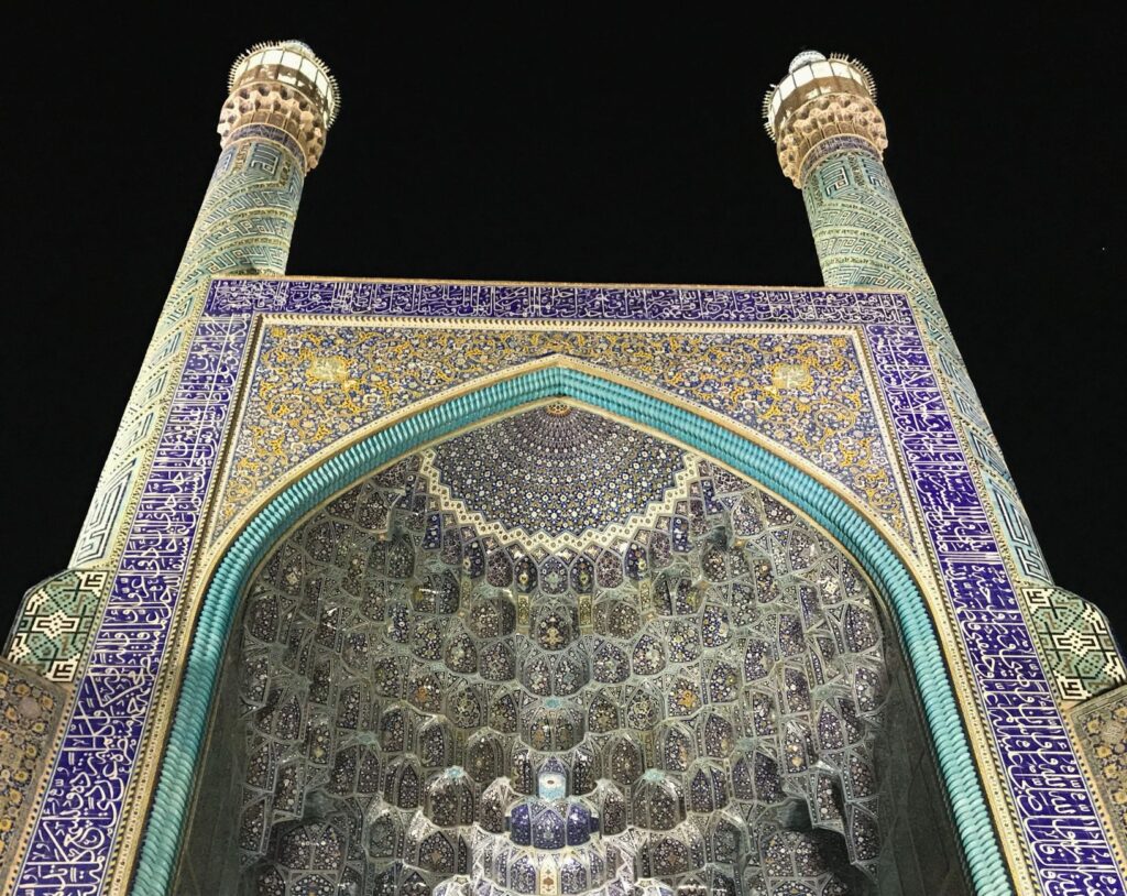 Mesmerizing view of the Jameh Mosque in Isfahan, showcasing its intricate tilework and architectural beauty at night.