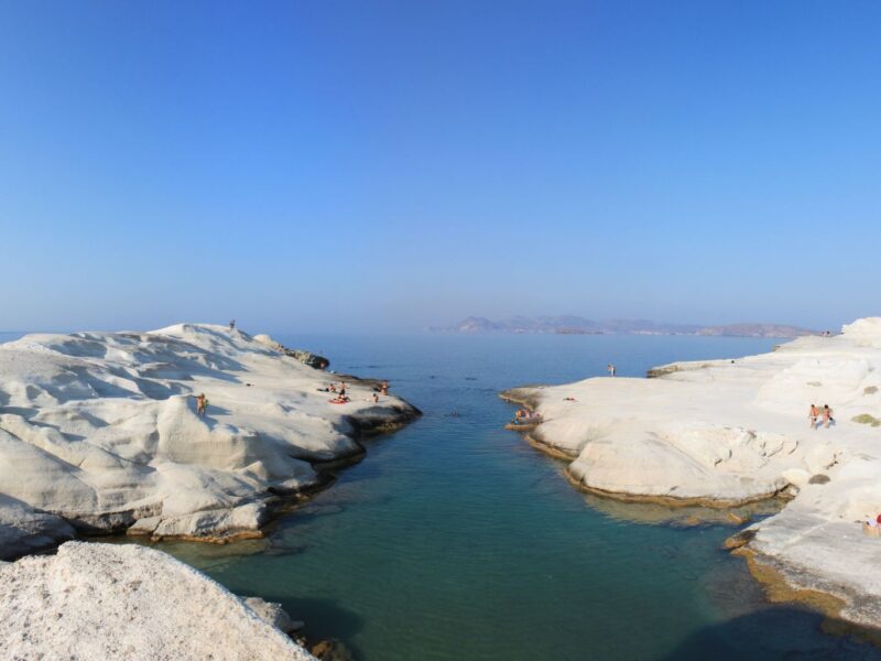 Stunning view of Sarakiniko Beach's unique white rock formations in Milos, Greece.